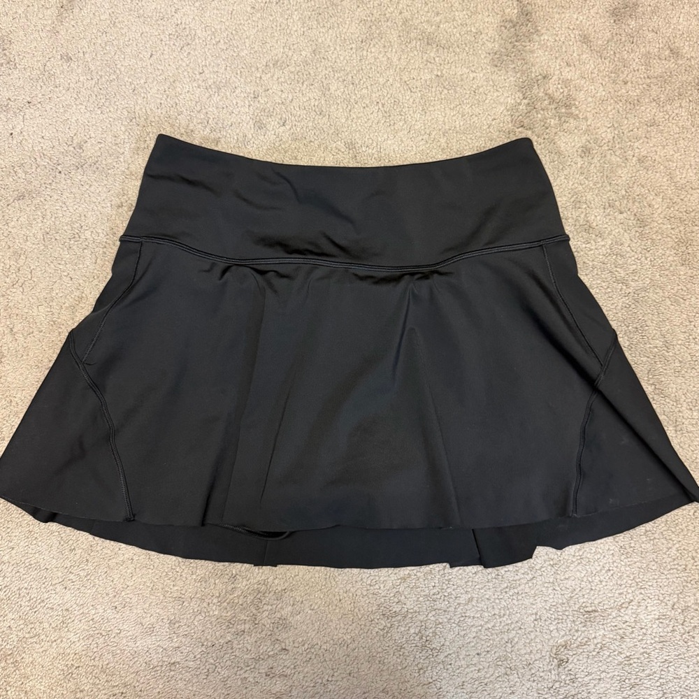 Athleta Ace Tennis Skort 13.5” in black. Size Medium. Like new